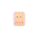 Enamel and gold palm tree stud earrings on earring card