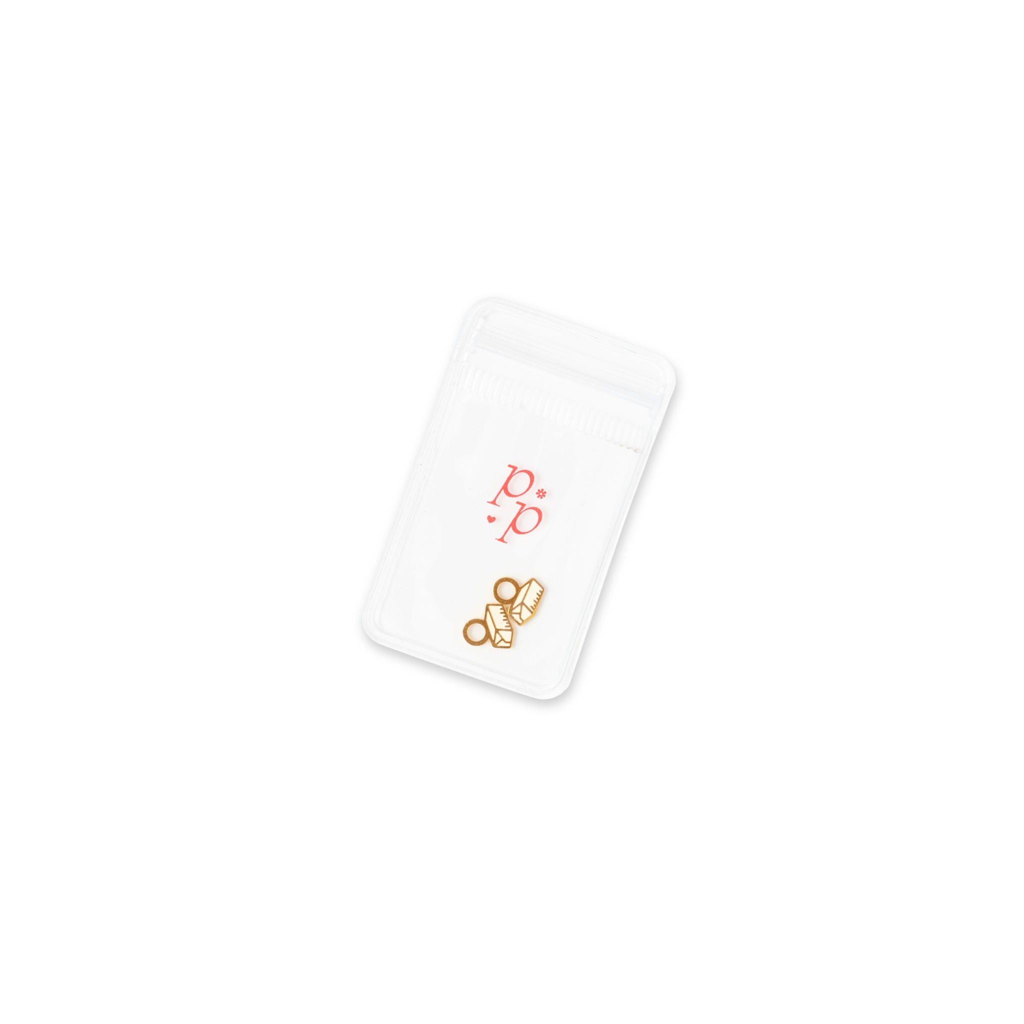 Gold butter charm in clear packaging 