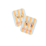 Two pairs of earrings on 'pip pop' branded cards against a white background