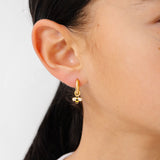 Gold hoop with small bee charm earring