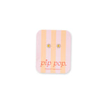 Square coaster with striped design and 'pip pop' text on a white background