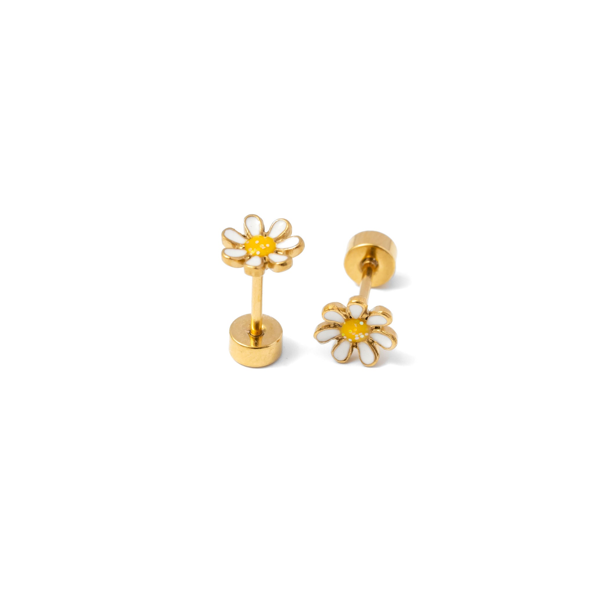Gold flower-shaped earrings on a white background