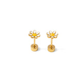Pair of gold flower-shaped earrings on a white background