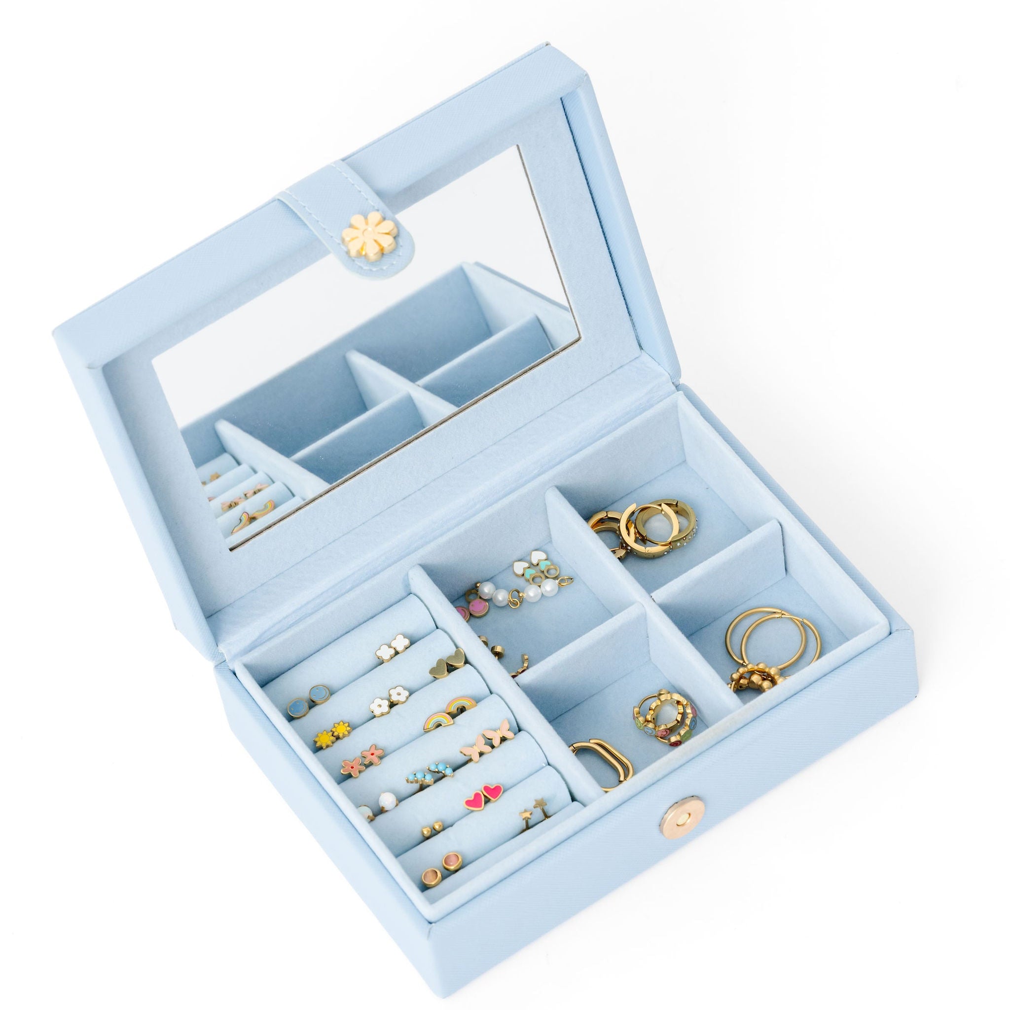 Blue jewelry box with stud earrings and hoops