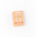 Packaged art palette earrings with 'pip pop' branding on a white background