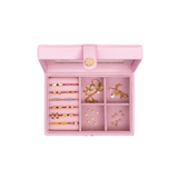 Pink kids jewelry box filled with Pip Pop hypoallergenic stud earrings — earring storage for girls