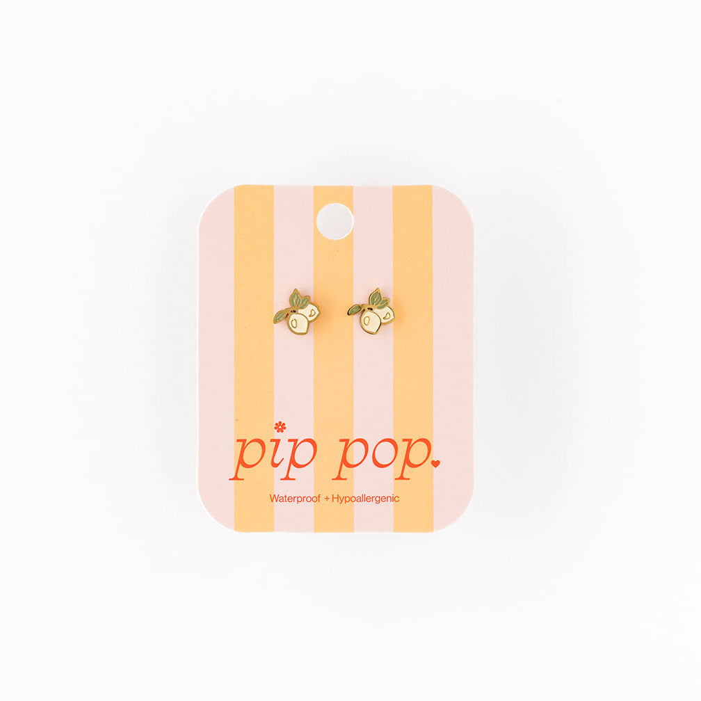 Pair of earrings on a striped card with 'pip pop' branding on a white background