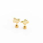 Gold lemon earrings on white background