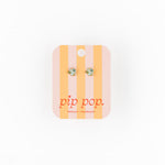 Earring card with earrings on a white background, featuring the brand 'pip pop'.