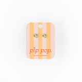 Earring card with earrings on a white background, featuring the brand 'pip pop'.