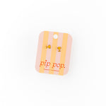 Striped trophy product tag with 'pip pop' branding on a white background